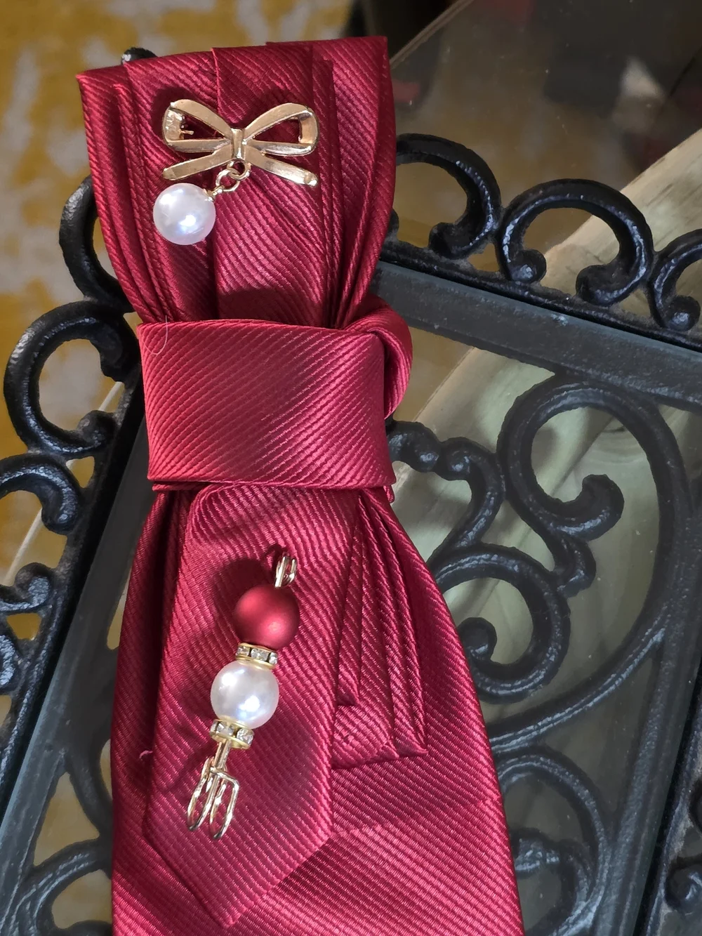 Elegant Red Bow Pendant Necklace with Pearl Accents